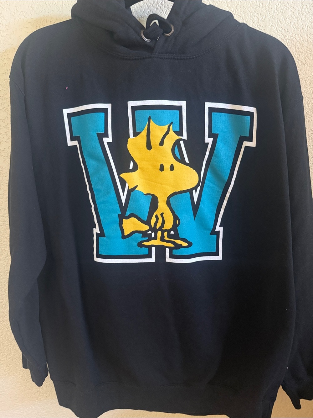 Black Crewneck Sweatshirt with Blue 'W' and Yellow Graphic